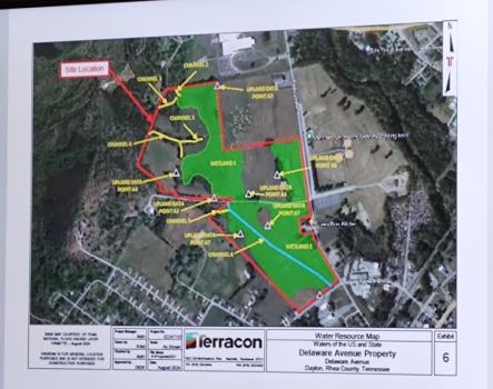 An architectural drawing shows the area left for construction on the Able Property in the red box. The area in the upper right hand corner is where the TCAT/Chattanooga State School will be going. Areas in green are wetlands