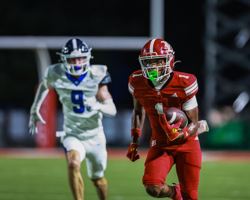 Baylor's Antwaun Adams (1) outraces McCallie's defenders for a catch and run touchdown.