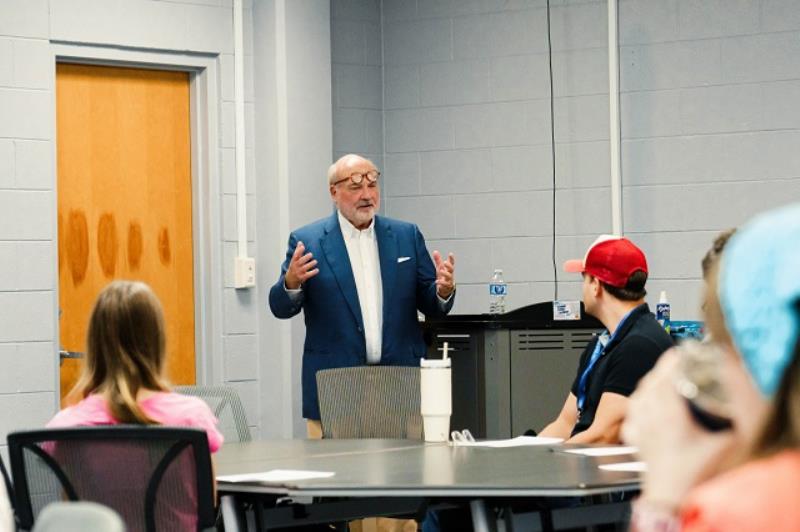 Mr. Jones visiting with students