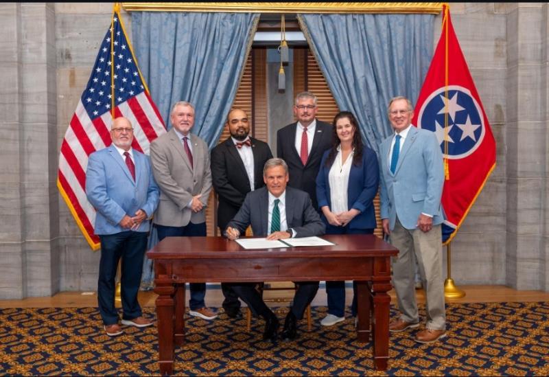 Governor Bill Lee signs legislation updating Tennessee's Athletic Training Practice Act. From left, Senator Haile, Rep. Tim Hicks, Tennessee Athletic Trainers' Society Vice President Thaddeus Avery, Governor Bill Lee, Johnnie Anderson, Dr. Racheal Lawler and Senator Tom Hatcher.