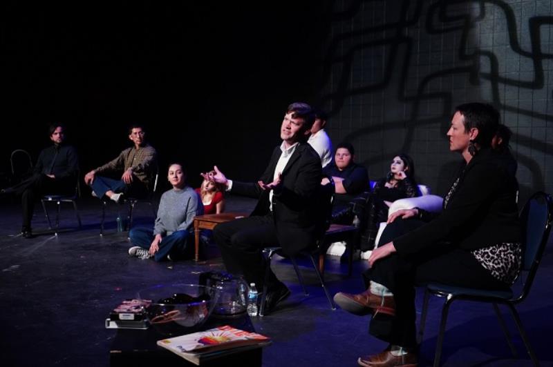 Gray creator, Matt Schaffner (center), answers audience questions after opening night at UTEP. Gray director, Rebecca Mayer (right), and student performers listen on stage.