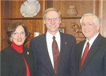 New Hiwassee College President Dr. James Noseworthy, center, with his wife, Karla, and Dr. Al Bowles of the board of trustees. Click to enlarge. 