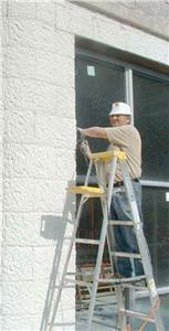 Joe Sequens at work on the Burchay building downtown. Click to enlarge.
