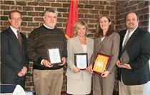 From left, Chad Harris, vice president of Chattanooga Mortgage Bankers Association, presented top production awards to Jack Shelton, Wells Fargo, and Bootsie Yates, First Tennessee, Siver Award; Jill Green, Amsouth Bank, Gold Award; and Greg DeMars, Suntrust Mortgage, Platinum Award. Click on all our photos to enlarge.