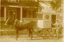 Sprague Dairy delivery wagon.  Anyone recognize the man or the house?  Click to enlarge.