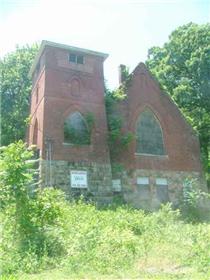 Brick church has long stood vacant.