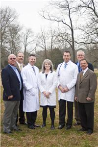 Shown, from left to right, are Mr. Kugler, Mr.. Kugler, Dr. Rudolph, Dr. Baysden, Dr. Newby, Mr. Fromm, and Mr. Tacker. 