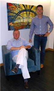 CEO Jay Simpson and his son, Bart Simpson, vice president of client development