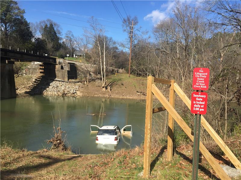 Car Lands In Water At Audubon Acres