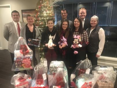 Leitner, Williams, Dooley & Napolitan, PLLC employees with their Angel Tree gifts 