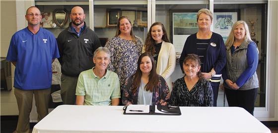 On hand to celebrate with Shanen Croft (seated, center) were Darrell and Angela Croft. On the back row is Trion High School’s Jason Lanham, Trion High School Principal Bryan Edge, Trion High School cheer coach Kelly Vireze, Trion High School cheer coach Jordan Durden, Georgia Northwestern cheer coach Karen Stoker and Trion High School cheer coach Pam Bridges. 