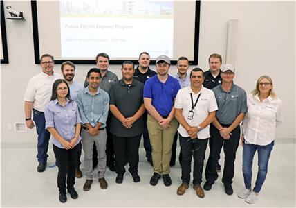 Back row, from left, Michael Fetter, assistant manager Pilot Hall Launch; Andreas Graber, adv. specialist, UPS/Testing Systems; Jan van Gerpen, senior manager, Pilot Hall Electric/Electronic; Phillip Brackett, FEEP, vehicle analysis apecialist; Sergei Dzhuga, vehicle analysis specialist; and Justin Baugh, KSK/Bordnetztesting technician.  Front row, from left, Svetlana Moskalenko, adv. specialist CFT Management; Ramon Sandoval Plascencia, FEEP, vehicle analysis specialist; Bradley Romero, FEEP, UPS/testing system specialist; 
Howard Aleshire, FEEP, UPS/testing system specialist; Paulo Portela, director Pilot Hall; Steven Purcell, assistant manager, Pilot Hall Assembly; and Corinna Schmid, process operations specialist.