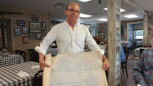 Stan Carnahan with plans for ante-bellum home to be built for event hall on Lookout Mountain