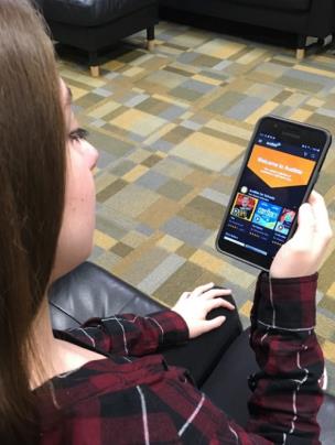 Julia Murphy, a ninth-grader at East Hamilton School, using the Audible app