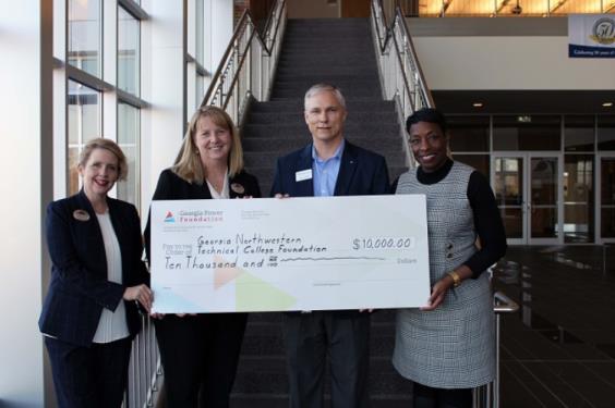 Lauretta Hannon (from left), director of Institutional Advancement for GNTC, stands with GNTC President Dr. Heidi Popham; Joel Hanner, external affairs manager for Georgia Power and Cassandra Wheeler, regional director for Georgia Power. The representatives from the power company's foundation presented the GNTC Foundation with a $10,000 to assist students in their college journey.