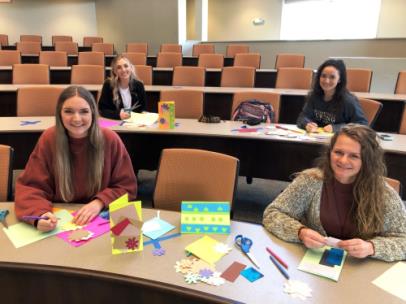 Making the cards are senior nursing students, from left, Emily Wimpelberg, Marah Mussro, Shekinah Miranda, and Natalie Moyer