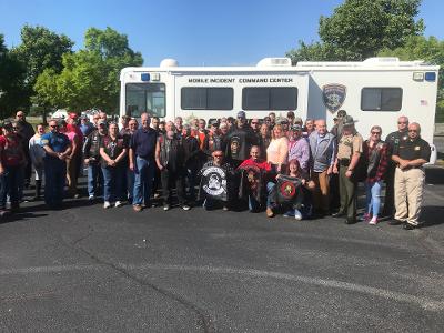 Cleveland 100 President Brenda Lawson and board members Mayor Emeritus Tom Rowland and Judge Sandra Donaghy posed among some of the Bradley/Roughneck Motorcycle Club members and riders taking part Saturday in the 2021 Operation Hero Ride. This photo was taken just as cyclists prepared to take off for the annual ride, which benefits Cleveland 100.