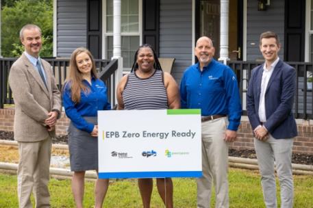 Pictured, left to right, are Habitat for Humanity CEO Jens Christensen, EPB’s Elizabeth Hammitt, homeowner Tempestt Jordan, EPB Energy Pro John Watts, and green|spaces Chattanooga Executive Director Michael Walton 