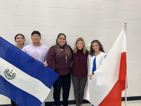 Pictured, left to right: Kaily Perez and Joel Lemus Rodriguez representing El Salvador; Carolina Roman, CSCC Multicultural coordinator; and Caroline Conner and Lucy Conner representing Poland