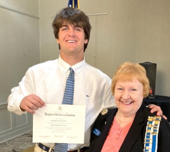 Brody Grant and Linda Crawford, regent of Nancy Ward Chapter