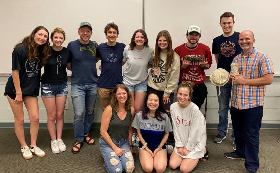 Students from Dr. Jonathan Cornett’s cancer biology class with members of the Lee community and Michaela Mackie’s family to participate in “Sewing Seeds of Hope