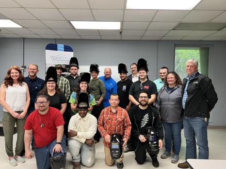 Pictured, back row, left to right: Chad Laxton, CSCC welding instructor; Dustin Johnson; Daryl Williamson; Heather Cabrera; David Goodwill, City Fields special projects coordinator; Kirkland Ellis; Dr. John Squires, CSCC interim vice president of Workforce Development, Institutional Research, and Advancement; and Jeremiah Turner. Pictured, middle row, left to right: Bre LaMountain, CSCC project coordinator; Kati Kime; Shelby Bond; Zachary Christofillis; Heather Brown, CSCC Workforce Development director; and Brian Deaton, Norfolk Southern Welding manager. Pictured, front row, left to right: James Williams; Chris Roberts; Jody Hyatt; and Luis Sanchez.