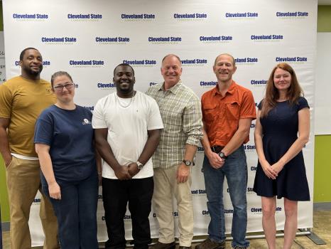 Pictured, left to right, at the graduation program: Dante Hickey, Patricia Vaughn, Jalen Hickey, City Fields Special Projects Coordinator David Goodwill, Cleveland State NCCER Construction Core Instructor Brad Laxton and Cleveland State Project Coordinator Bre LaMountain