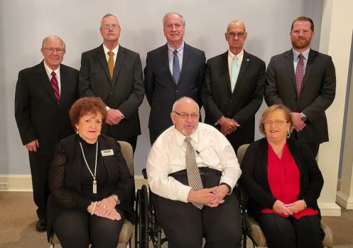 Hamilton Funeral Home staff, front row, Mamie Burkhart, Waymon Brown and Alice DeArman. Second row, Richard Floyd,
Thomas Earl Wilson. Jr. – location manager, Roger L. DeHart, Henry DeArman and Alex Vanderwall.
