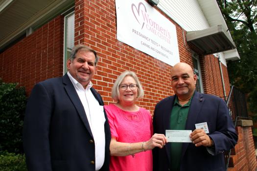 Joe Flaherty, Immediate Past State Deputy of the Alabama Knights of Columbus; Anita Johnson, Executive Director of the Women’s Care Center; and Danny Garcia, State Deputy for the Alabama State Council Knights of Columbus