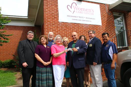 From left to right and across the front first: Father Rick Chenault, Pastor of Our Lady of the Valley Catholic Church in Fort Payne; Beverly Perea, Nurse Manager; Anita Johnson, Executive Director of the Women’s Care Center; Danny Garcia, State Deputy for the Alabama State Council Knights of Columbus; Joe Flaherty, Immediate Past State Deputy of the Alabama Knights of Columbus; Rafael Milan, member of the Fort Payne Council 13152 Knights of Columbus
Back Row: Mark Sandoval, Grand Knight of the Fort Payne Council 13152 Knights of Columbus; and Helen Pullen and Kristie Cole with the Women’s Care Center