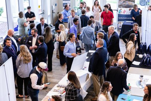 Lee students are shown interacting with representatives from more than 40 organizations during the recent School of Business recruitment and networking event