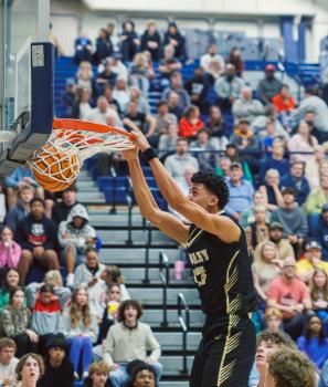 Bradley Central's (#23) Tyrese Stovall with a slam dunk in the Region 3-AAAA Championship Game against Walker Valley on Thursday night at Walker Valley.
