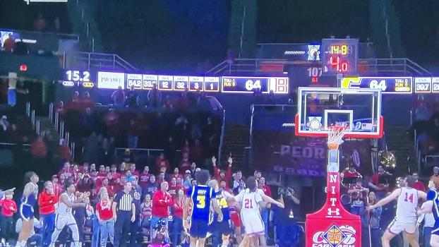 Trey Bonham, far left, watches as his game-winning shot splashes through the nets to lead UTC to NIT quarterfinal win over Bradley