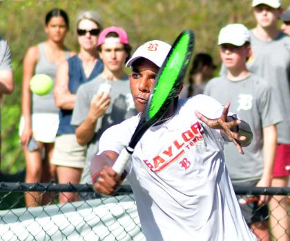 Baylor’s Anurag Kallambella plays in a singles match against McCallie’s Henry Imorde.