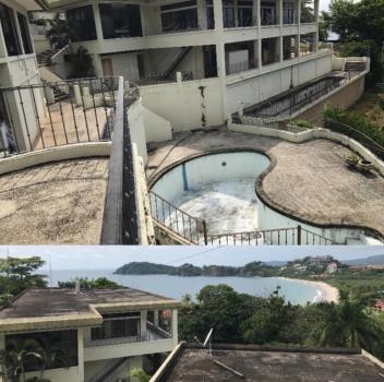 The Policia Station in Playa Flamingo, Costa Rica, is perched on a hillside within an enclave of multi-million dollar mansions