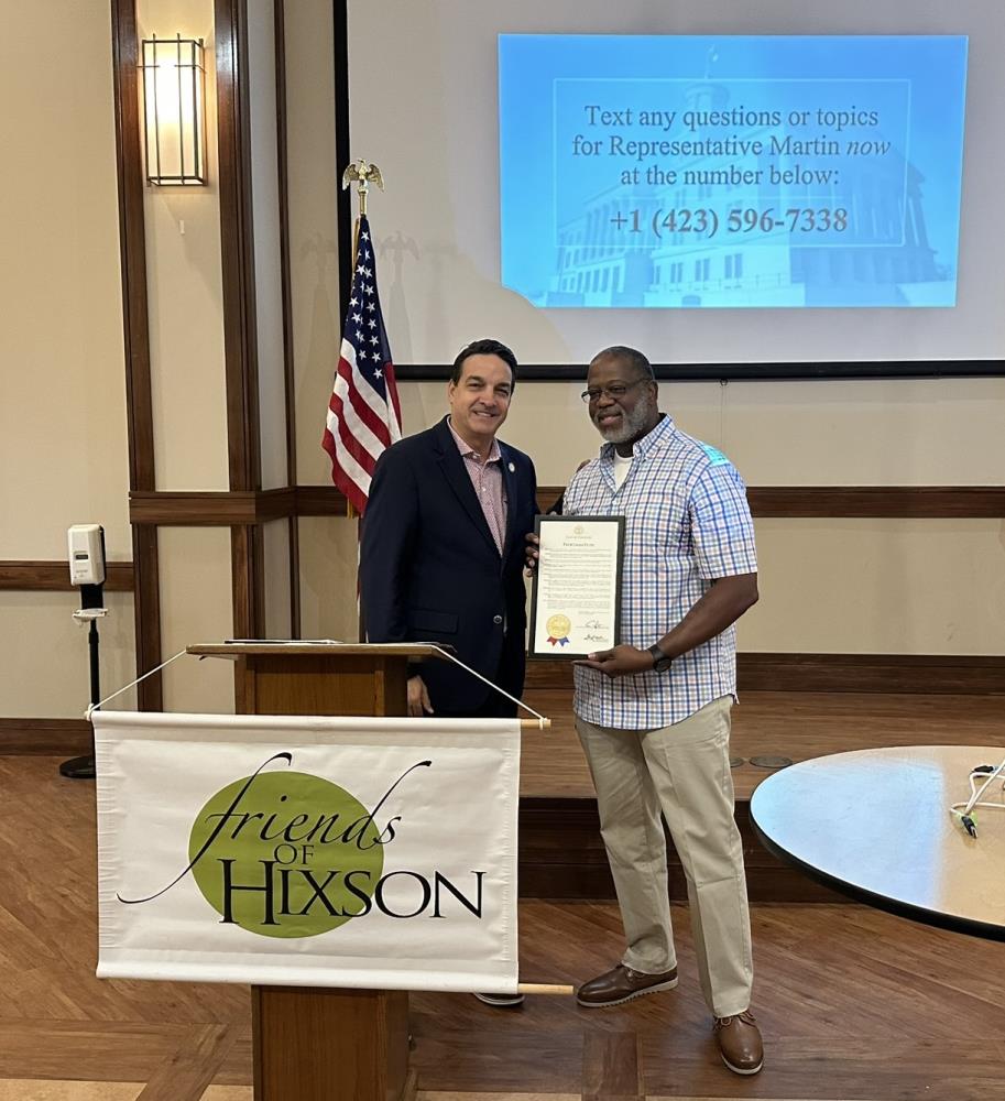 Tennessee State Representative Greg Martin presented an award at a Friends of Hixson meeting to retired SRO Deputy Mike Houston for his service in protecting our school, teachers and children.