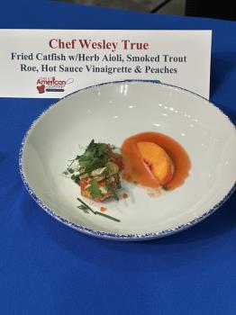 Chef Wesley True prepared a fried catfish with herb aioli, smoked trout roe, hot sauce vinaigrette and peaches to win the title King/Queen of American Seafood