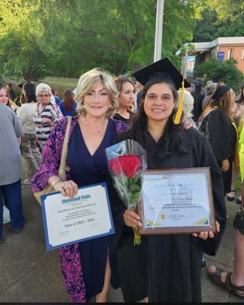 Dr. Terri Hall (left) celebrates with her student, YulianaDeLaCruz, at the Adult Education Graduation